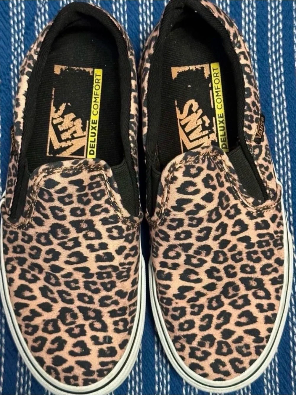 Vans Leopard Print Slip-On Sneakers in Pink and Black